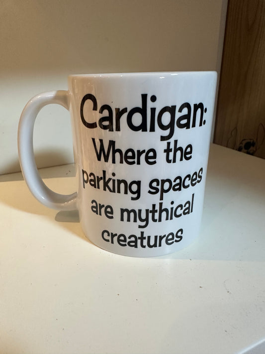 Cardigan: Where the Parking Spaces Are Mythical Creatures — Ceramic Mug